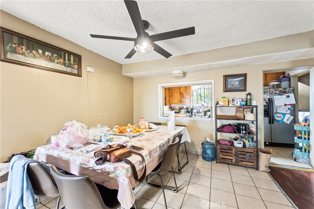 2424 West Boulevard Los Angeles, CA 90016 - Photo 12 of 21 a bedroom with a bed and a book shelf