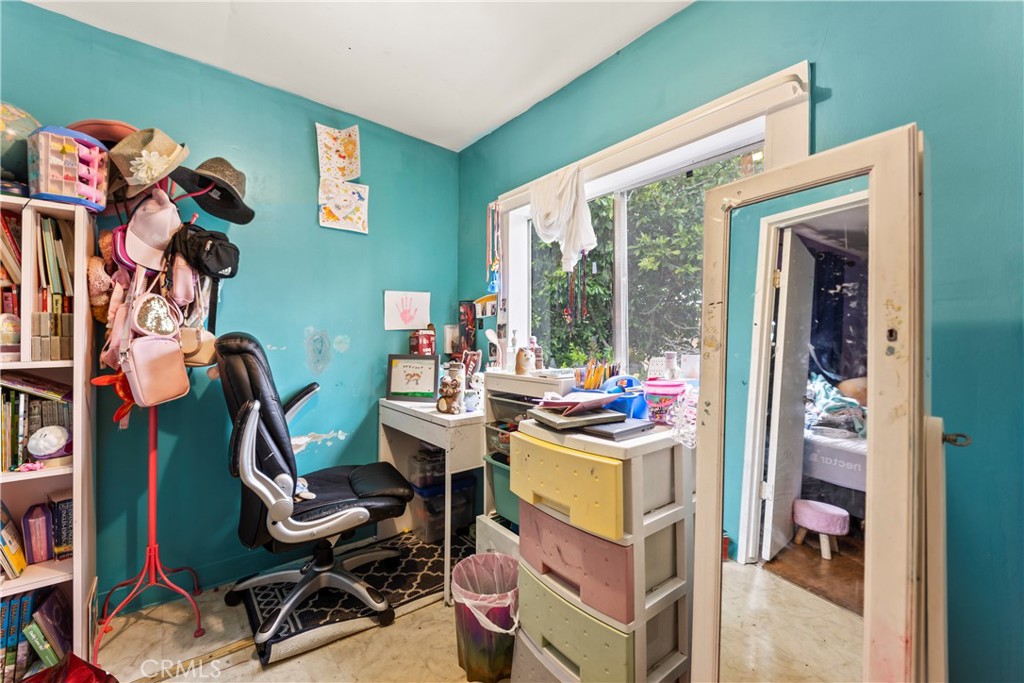 2424 West Boulevard Los Angeles, CA 90016 - Photo 19 of 21 a view of a workspace with furniture and a workspace