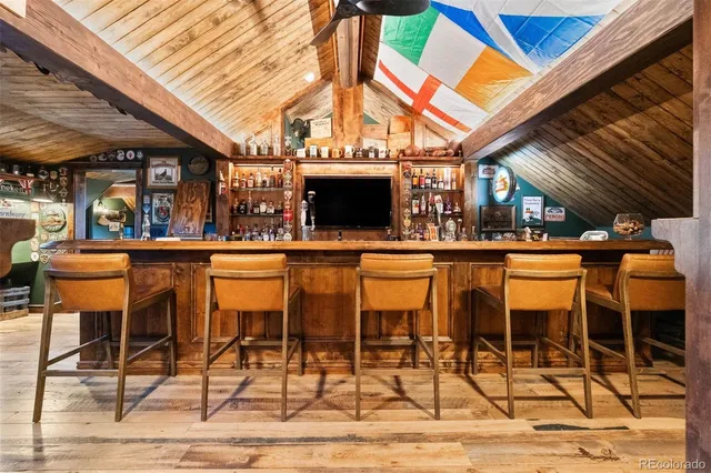 a view of a chairs and table in the patio