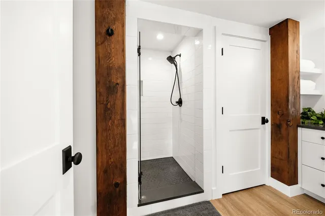 a view of a bathroom from a hallway