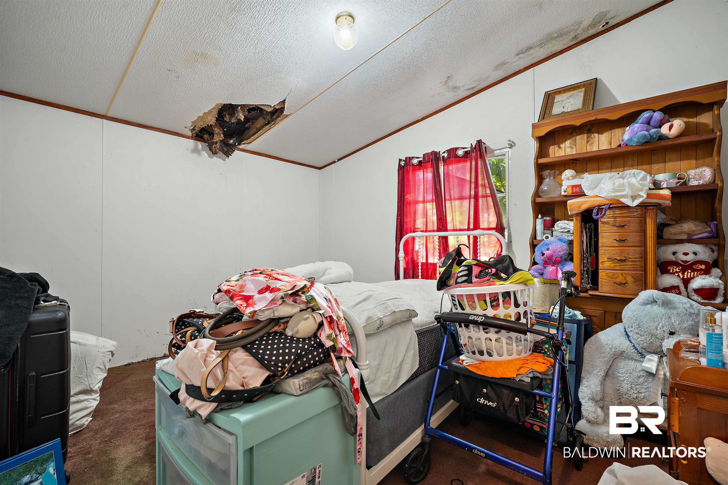 23700 Cumberland Road Robertsdale, AL 36567 - Photo 22 of 33 Bedroom featuring dark colored carpet, lofted ceiling, a textured ceiling, and ornamental molding