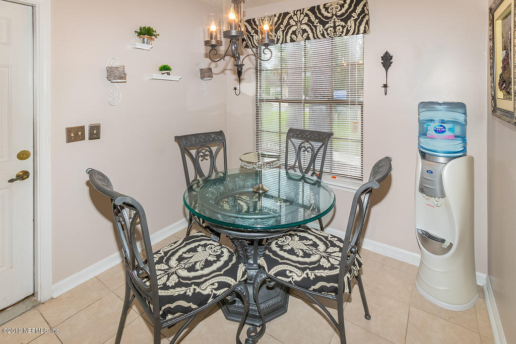 11012 Reading Road Jacksonville, FL 32257 - Photo 13 of 29 a view of a dining room with furniture