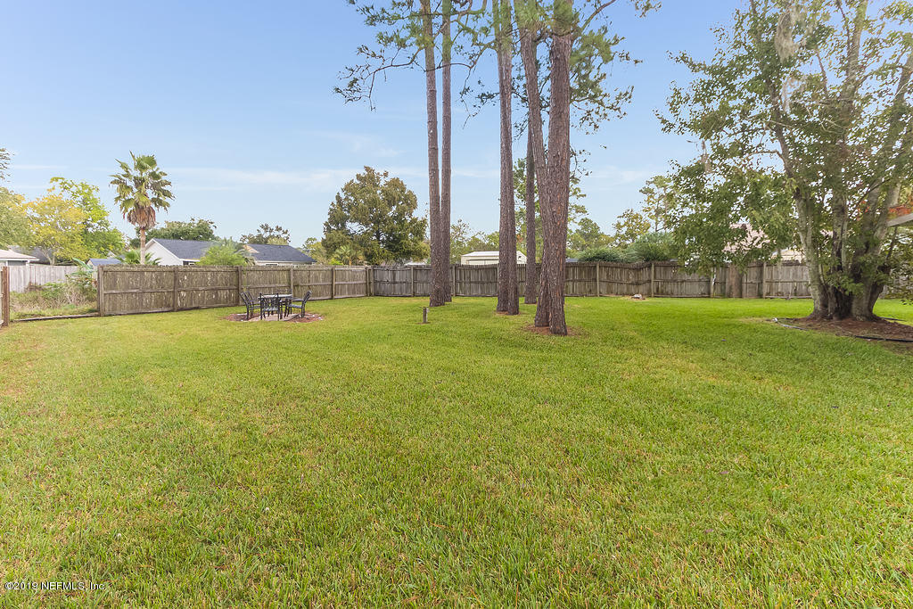 11012 Reading Road Jacksonville, FL 32257 - Photo 29 of 29 a view of swimming pool with an outdoor space and seating area