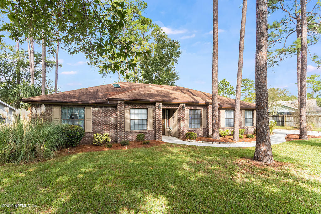 11012 Reading Road Jacksonville, FL 32257 - Photo 3 of 29 a view of a house with a yard and sitting area
