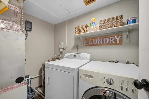 a utility room with dryer and washer