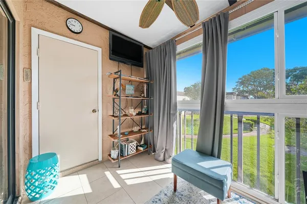 a living room with furniture and a window