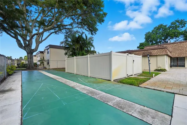 a view of a backyard of the house