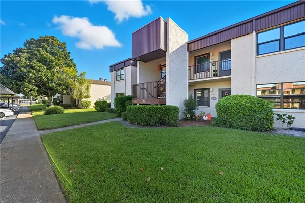 a house view with garden space