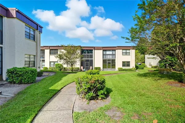 a view of a house with garden