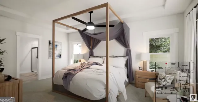 a bedroom with furniture and a window