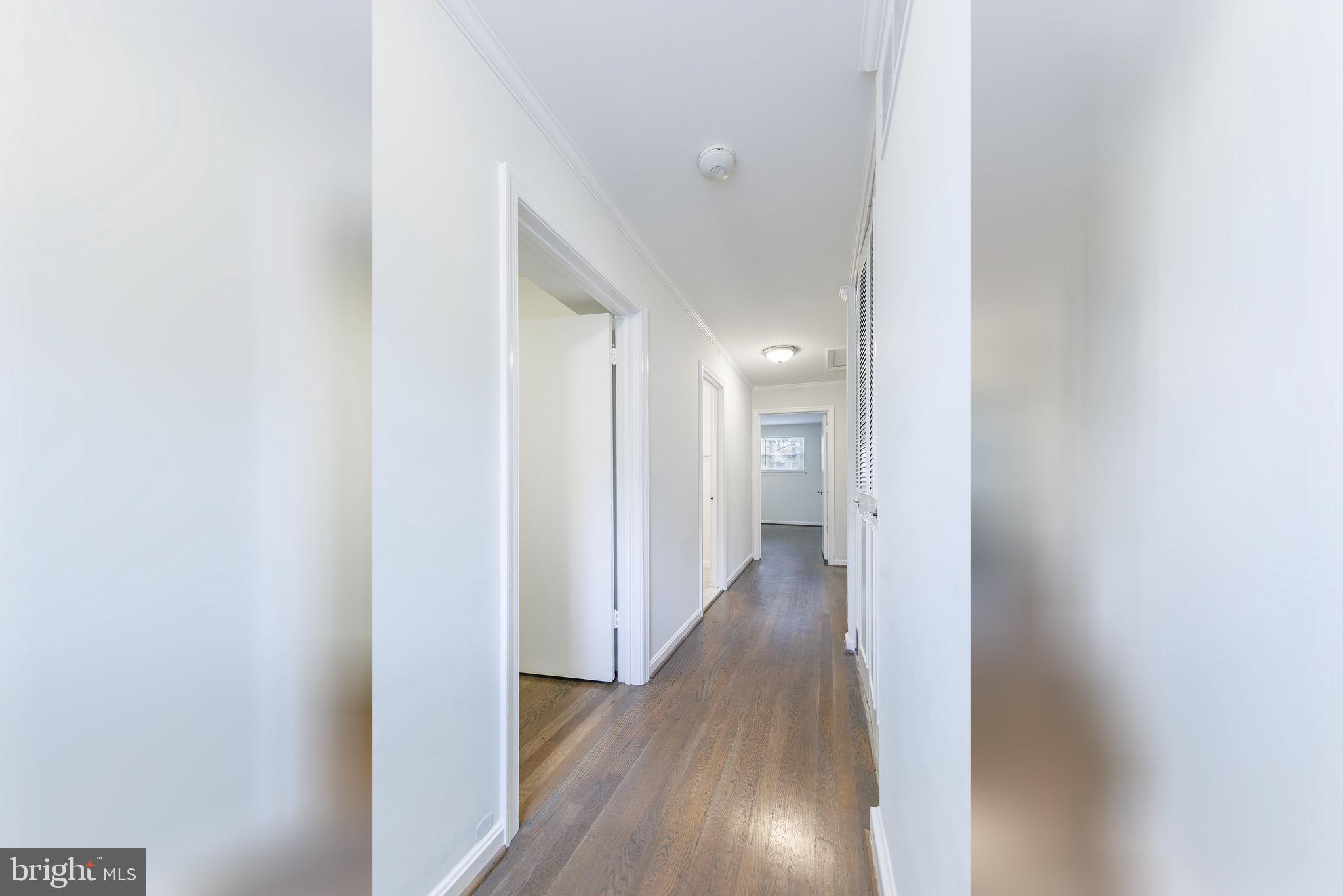 6800 Quebec Court Springfield, VA 22152 - Photo 20 of 44 Upstairs Hallway w/ Linen Closet