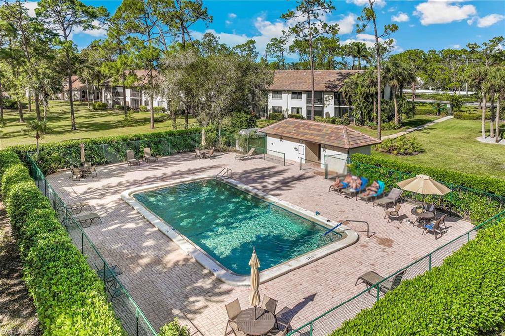 5841 Rattlesnake Hamm Road, Unit I101 Naples, FL 34113 - Photo 17 of 17 View of community swimming pool.