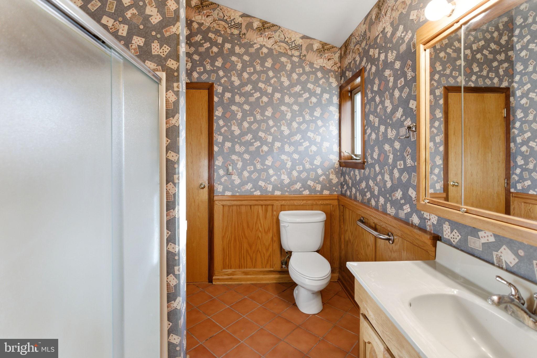 2 Digit Lane Bunker Hill, WV 25413 - Photo 59 of 122 a bathroom with a granite countertop toilet and a sink