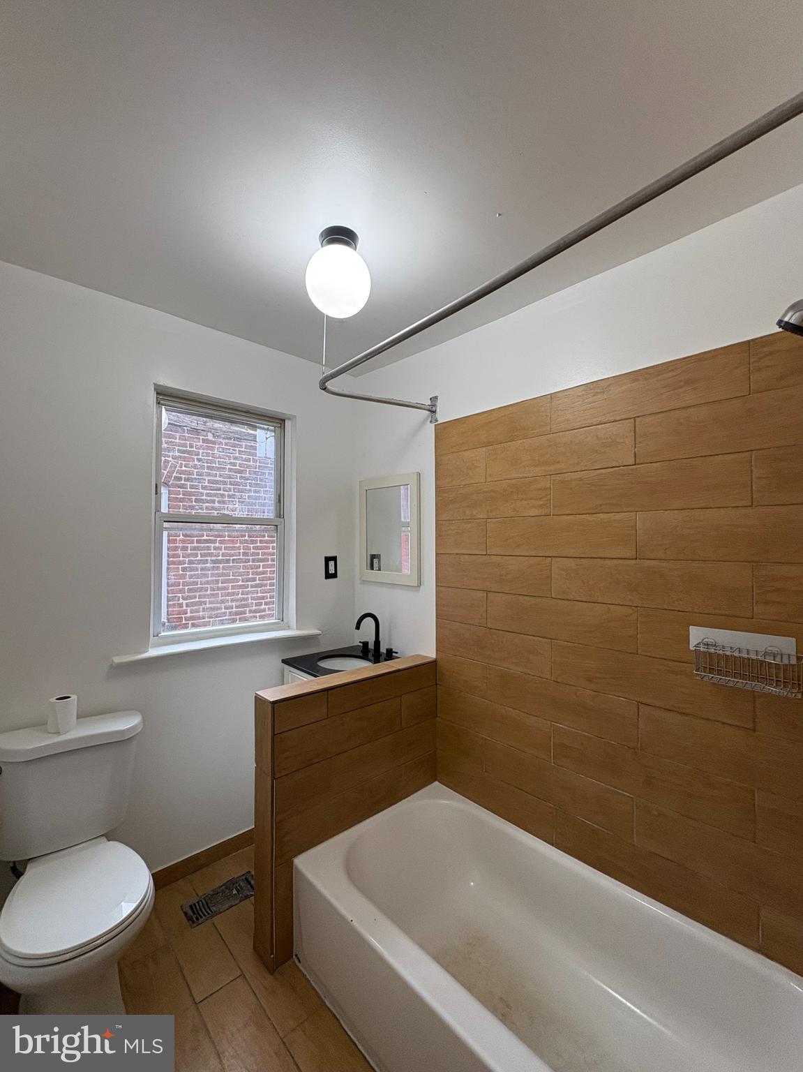 5504 Devon Street Philadelphia, PA 19138 - Photo 9 of 16 a bathroom with a sink and a toilet