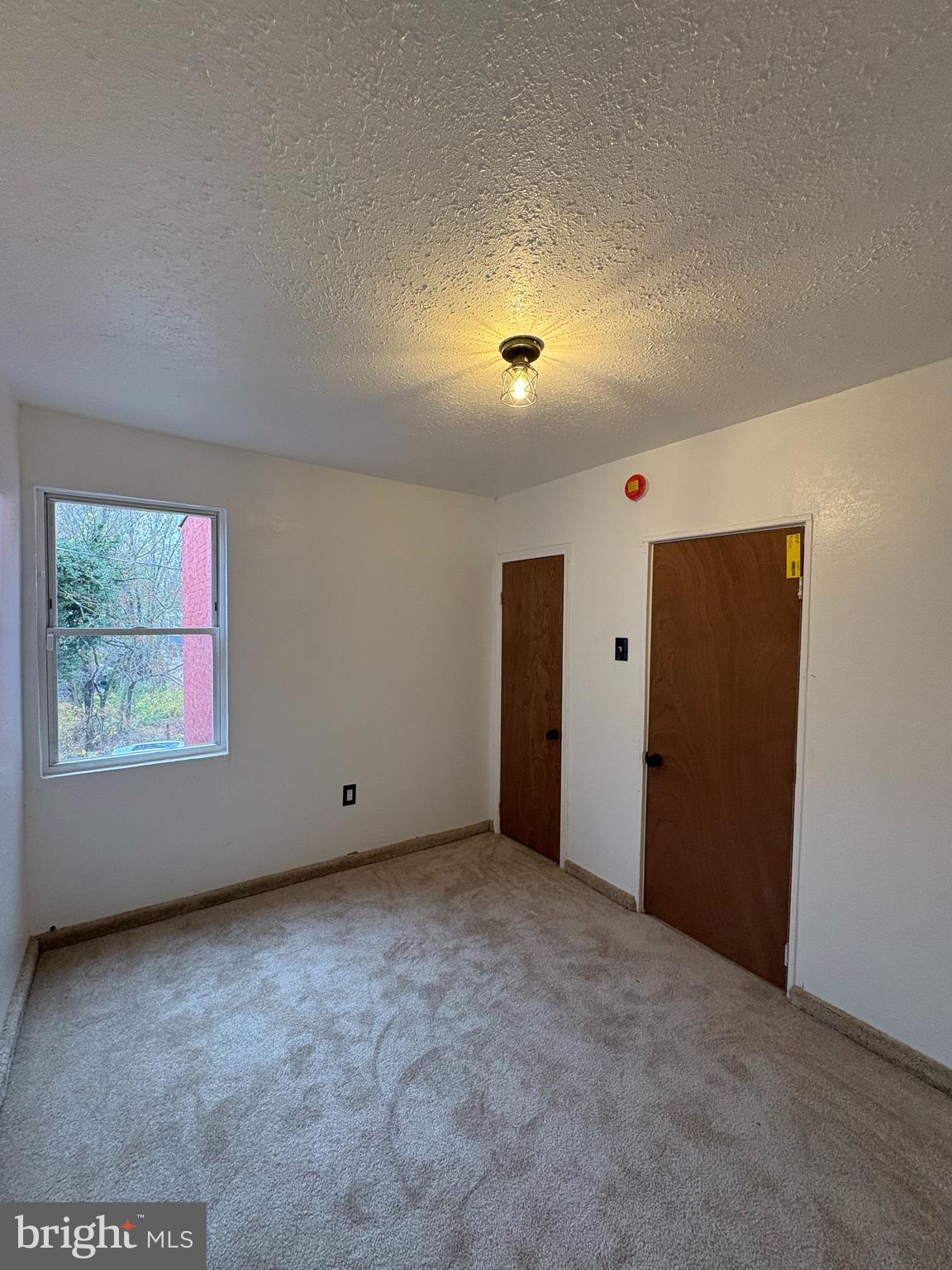 5504 Devon Street Philadelphia, PA 19138 - Photo 10 of 16 an empty room with windows