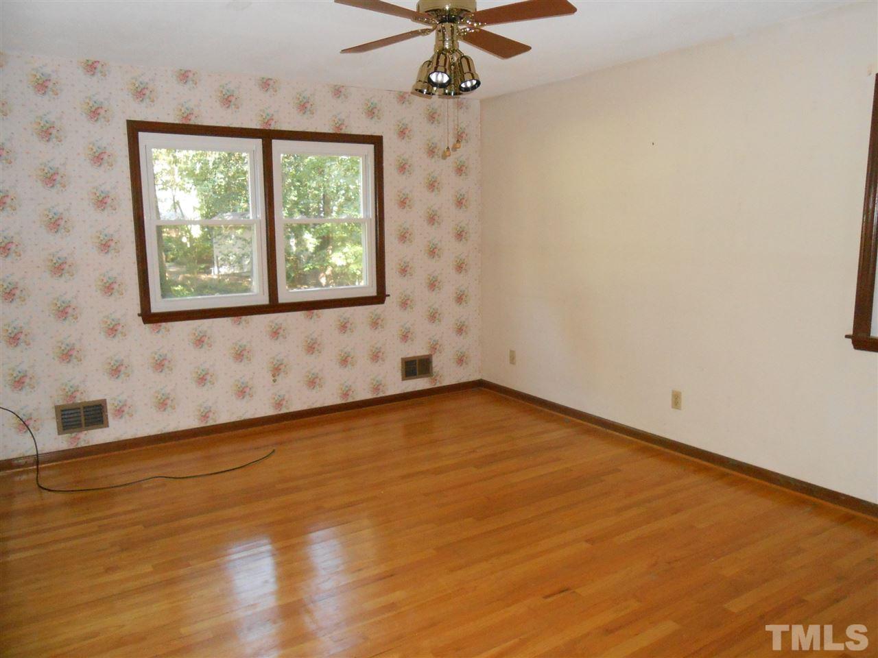4508 Oak Park Road Raleigh, NC 27612 - Photo 15 of 24 an empty room with a window
