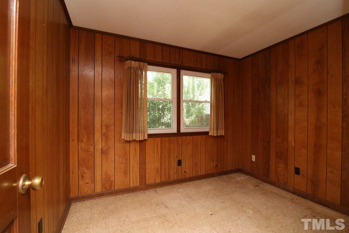 4508 Oak Park Road Raleigh, NC 27612 - Photo 18 of 24 a view of an empty room and window