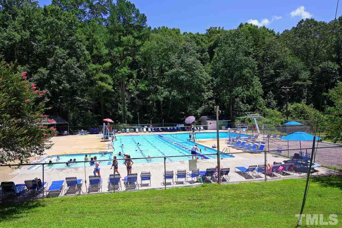 4508 Oak Park Road Raleigh, NC 27612 - Photo 24 of 24 a view of a house with a swimming pool