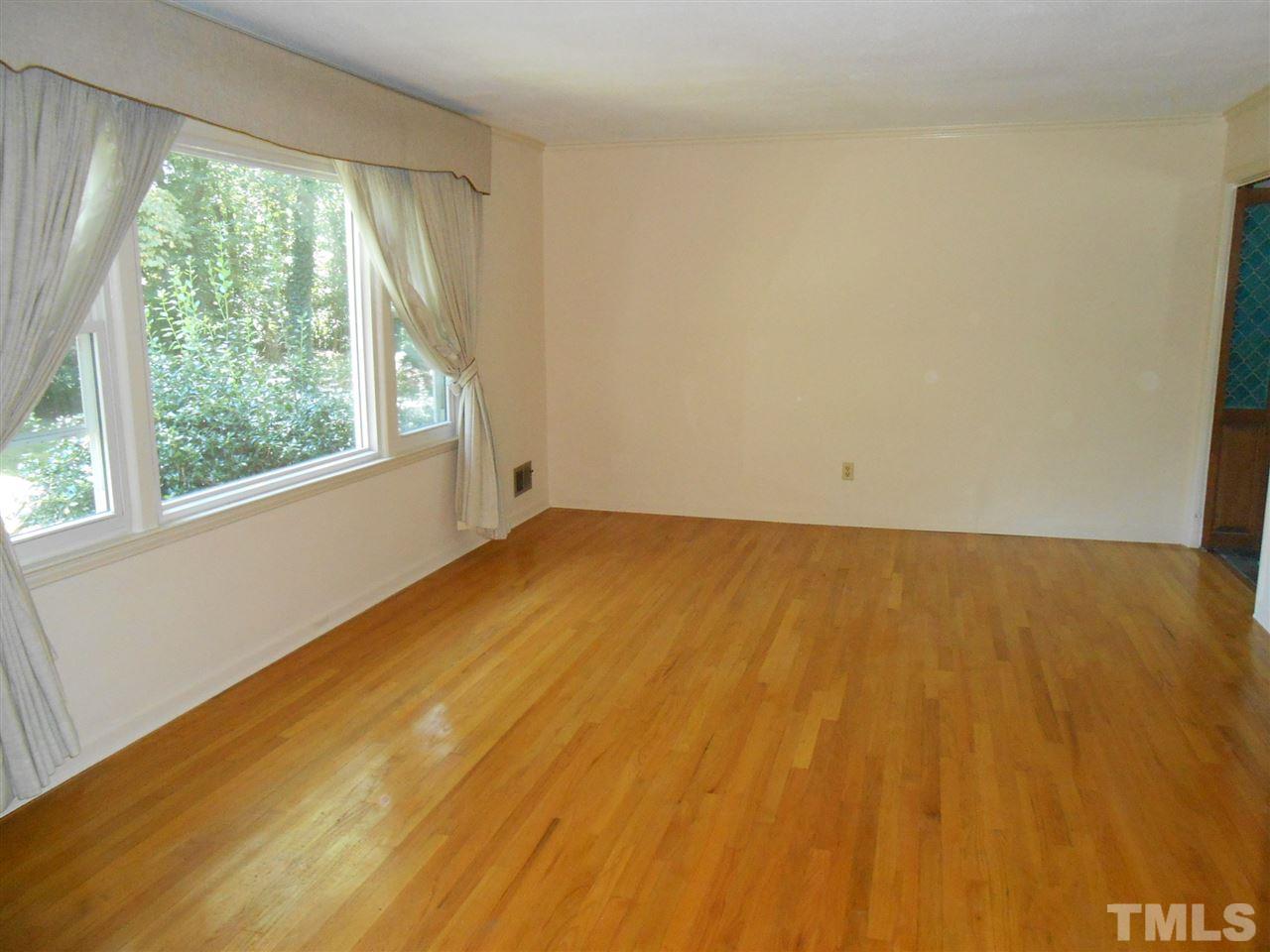 4508 Oak Park Road Raleigh, NC 27612 - Photo 9 of 24 an empty room with a window
