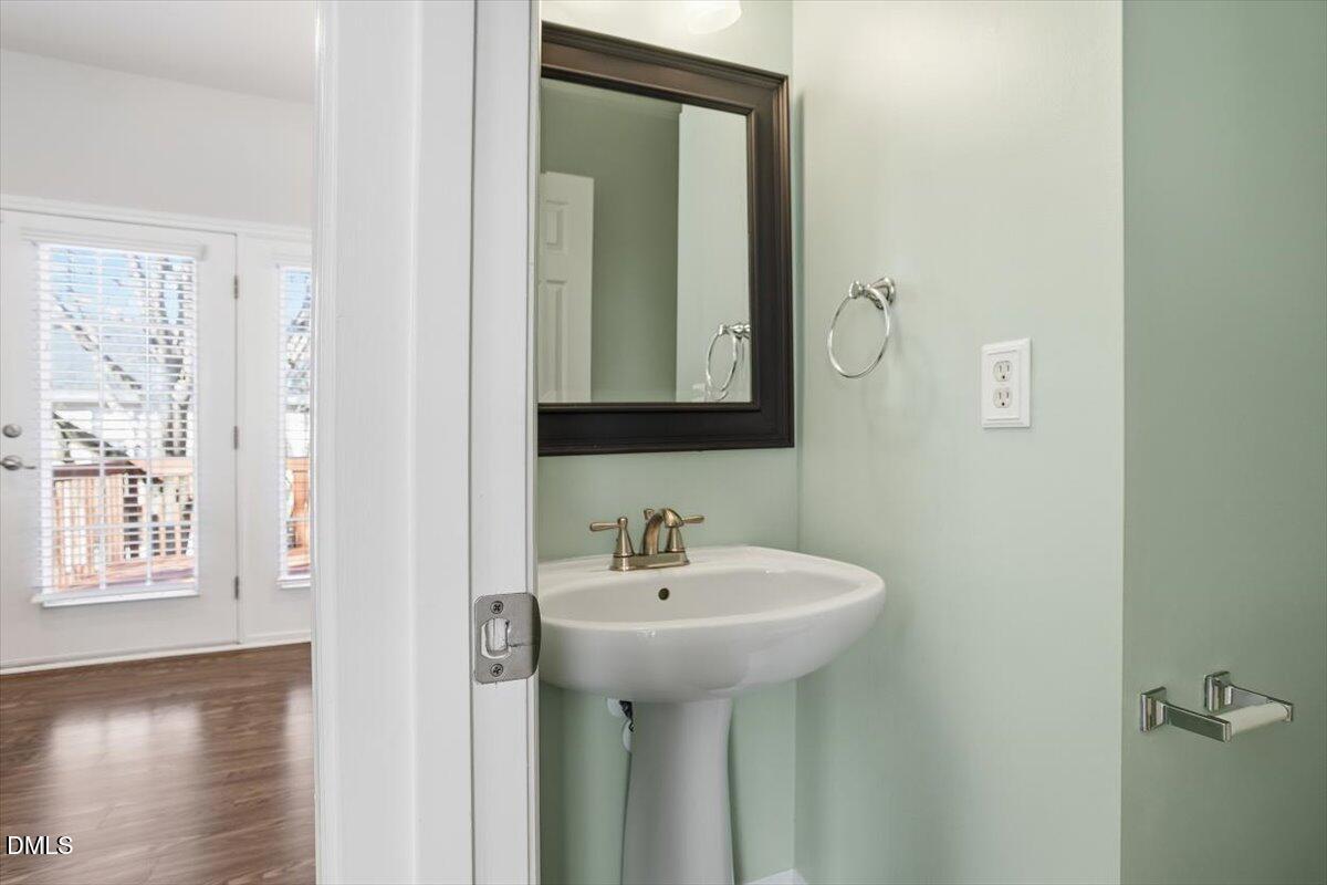 5531 Crabtree Park Court Raleigh, NC 27612 - Photo 13 of 41 a bathroom with a sink and a mirror