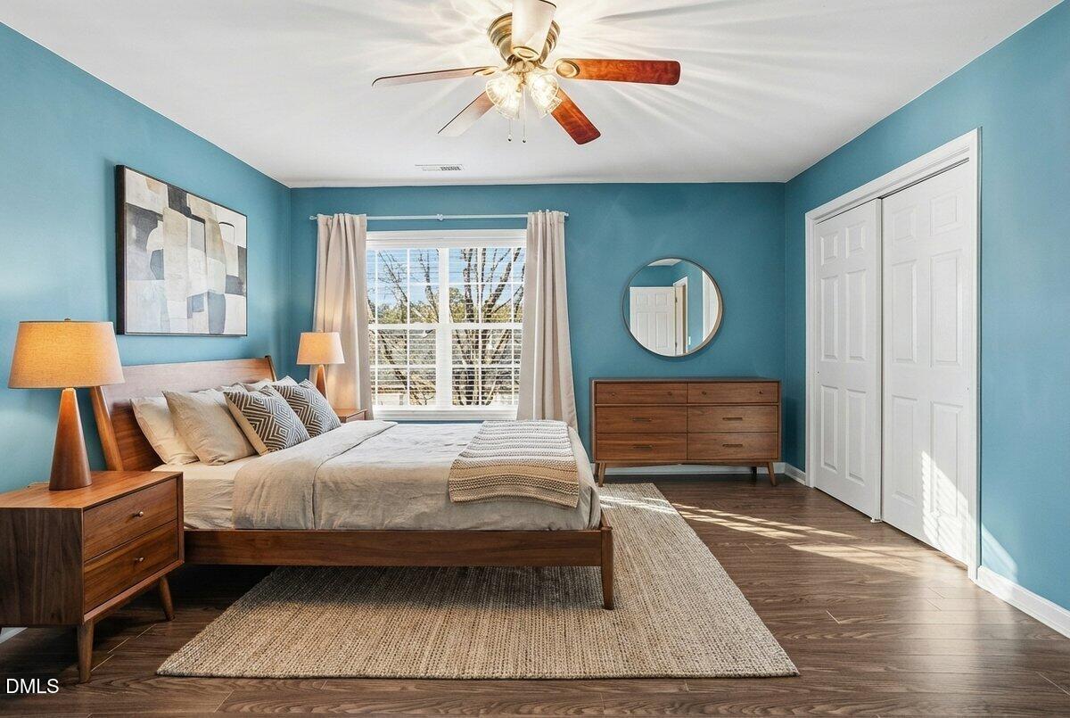 5531 Crabtree Park Court Raleigh, NC 27612 - Photo 20 of 41 a bedroom with a bed a window and dresser
