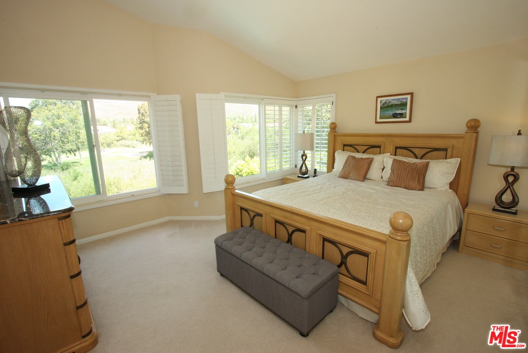 553 Fairfield Road Simi Valley, CA 93065 - Photo 29 of 49 a bed room with a bed and a couch