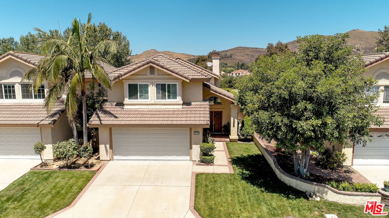 553 Fairfield Road Simi Valley, CA 93065 - Photo 4 of 49 a front view of a house with garden