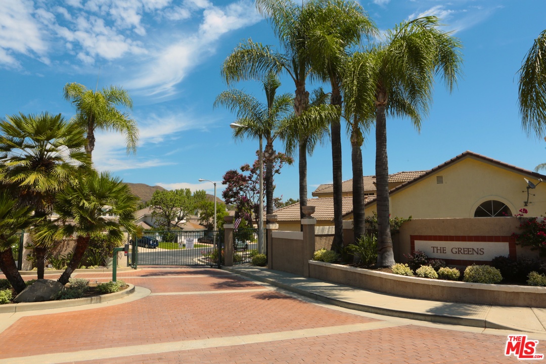 553 Fairfield Road Simi Valley, CA 93065 - Photo 36 of 49 a view of a house with a yard and palm trees