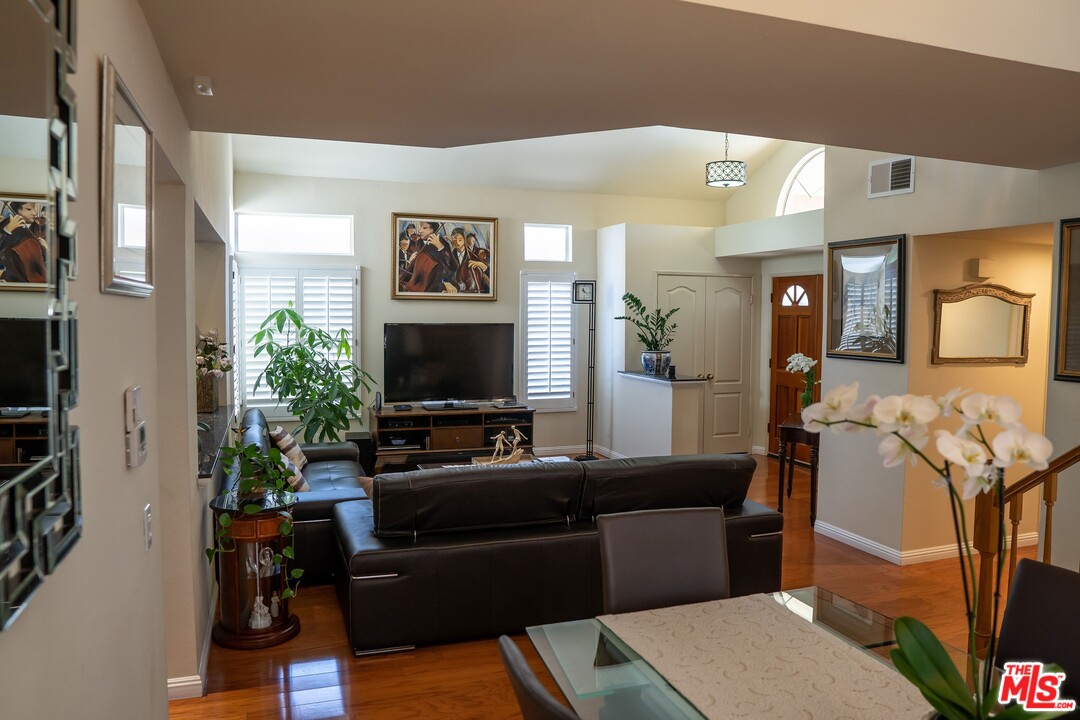 553 Fairfield Road Simi Valley, CA 93065 - Photo 46 of 49 a living room with furniture and a flat screen tv