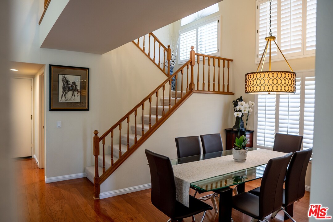553 Fairfield Road Simi Valley, CA 93065 - Photo 8 of 49 a view of a dining room with furniture window and wooden floor