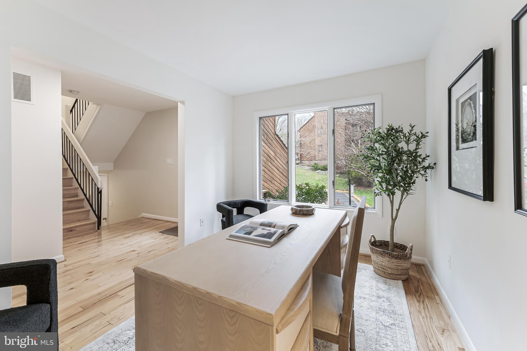 2261 Cedar Cove Court Reston, VA 20191 - Photo 18 of 102 a view of a dining room with furniture window and wooden floor