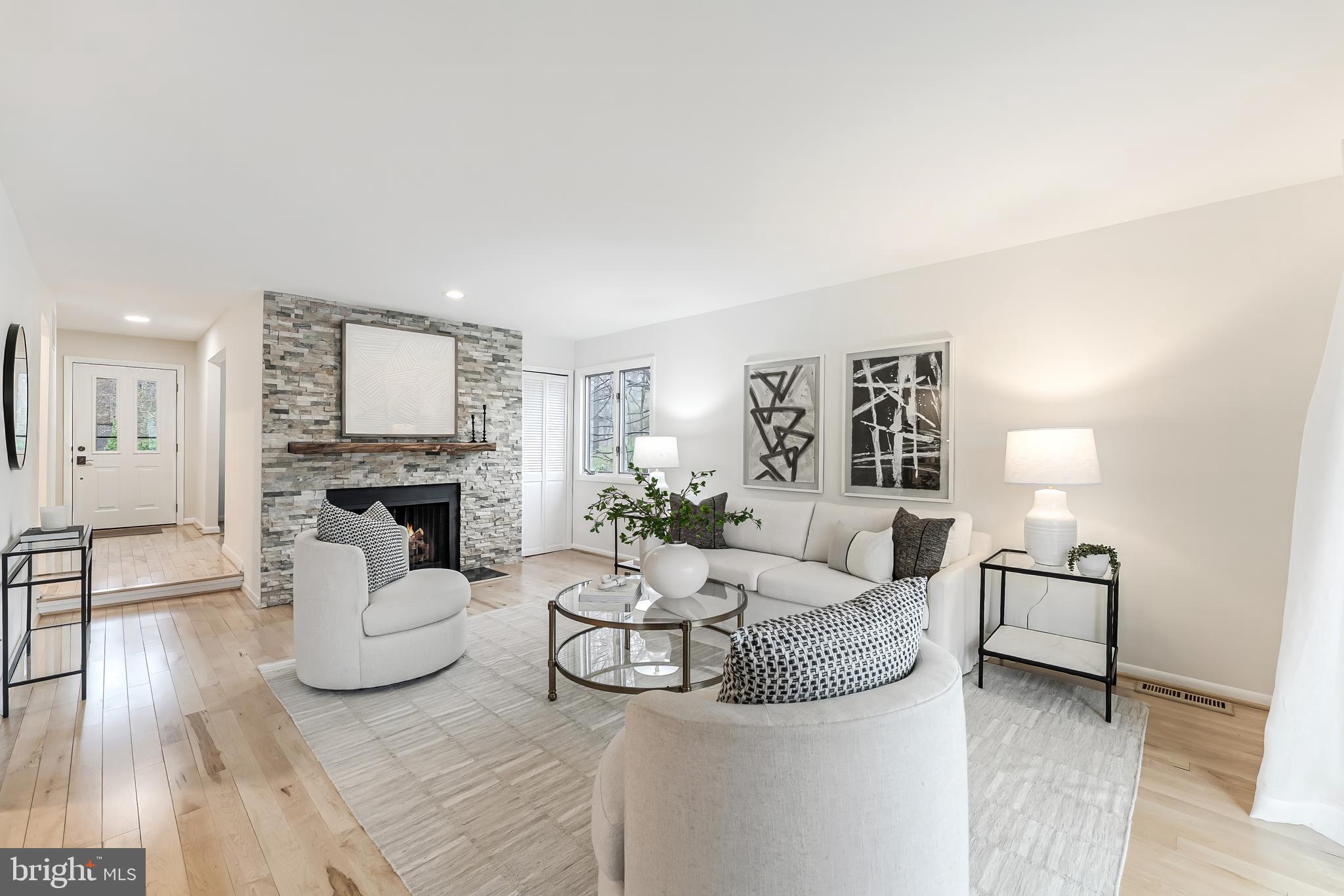 2261 Cedar Cove Court Reston, VA 20191 - Photo 19 of 102 a living room with furniture and a fireplace