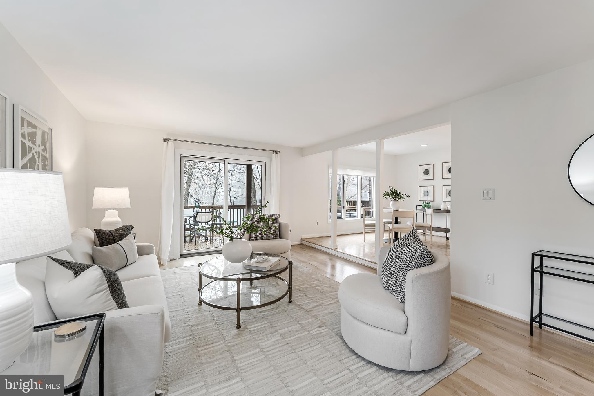 2261 Cedar Cove Court Reston, VA 20191 - Photo 22 of 102 a living room with furniture and a large window