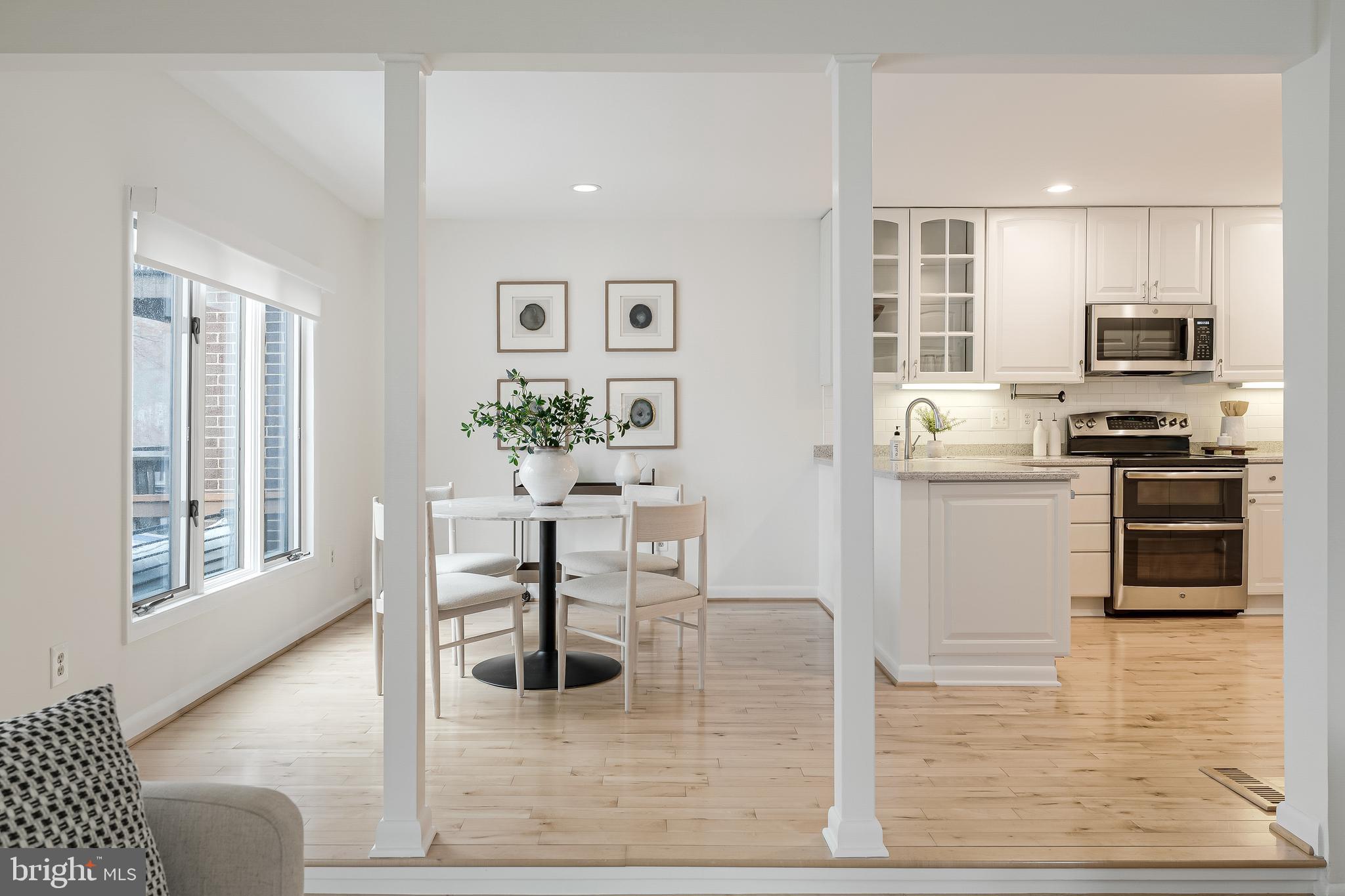 2261 Cedar Cove Court Reston, VA 20191 - Photo 23 of 102 a kitchen with stainless steel appliances kitchen island granite countertop a stove a sink and a refrigerator