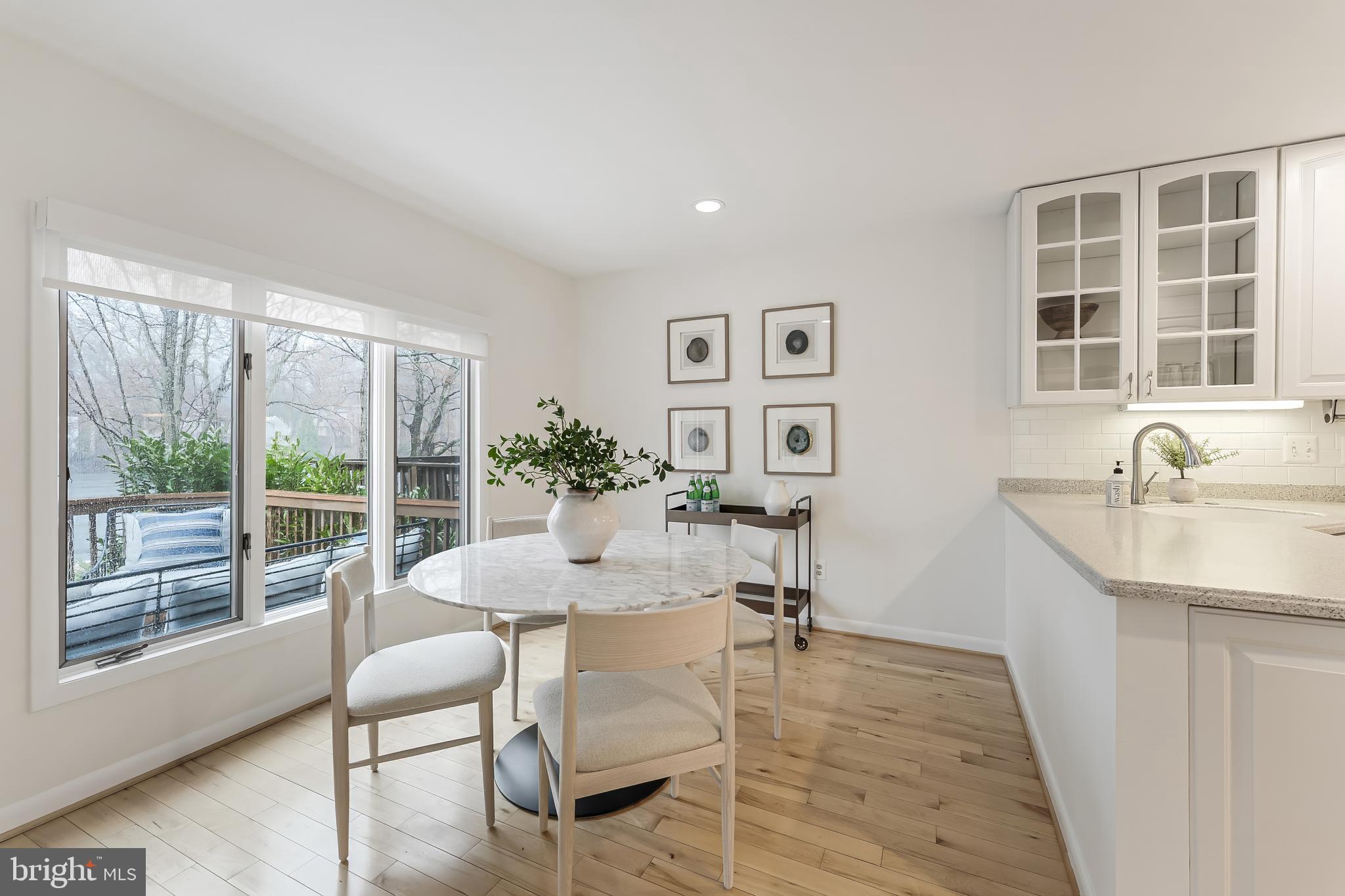 2261 Cedar Cove Court Reston, VA 20191 - Photo 24 of 102 a view of a dining room with furniture and windows