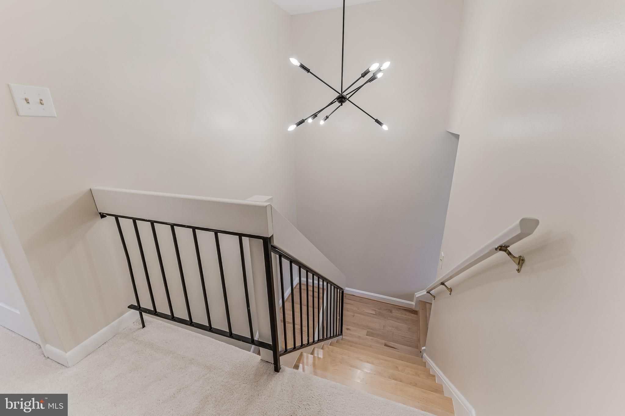 2261 Cedar Cove Court Reston, VA 20191 - Photo 38 of 102 a view of a hallway with a ceiling fan