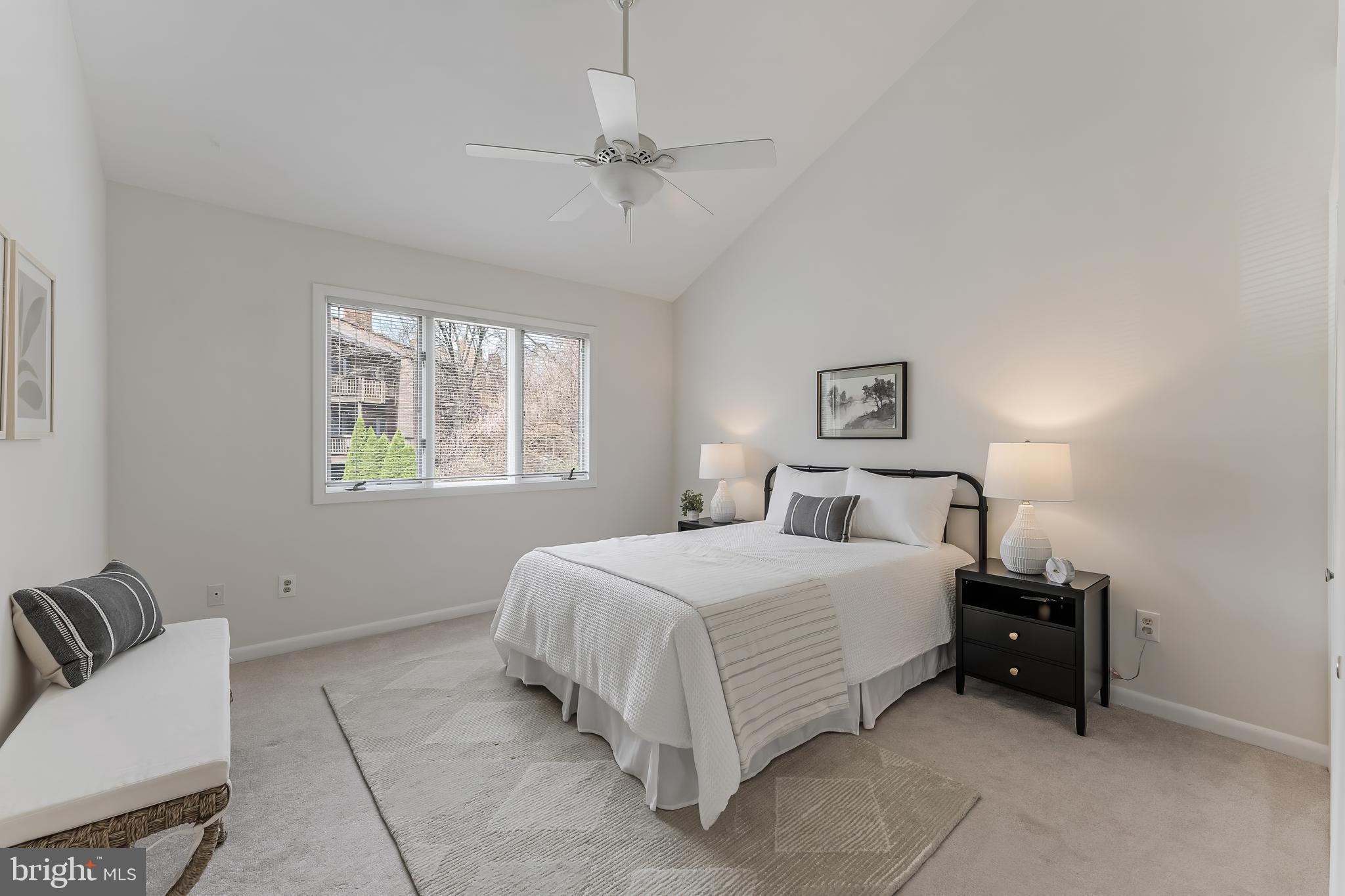 2261 Cedar Cove Court Reston, VA 20191 - Photo 39 of 102 a bedroom with a bed and a chair