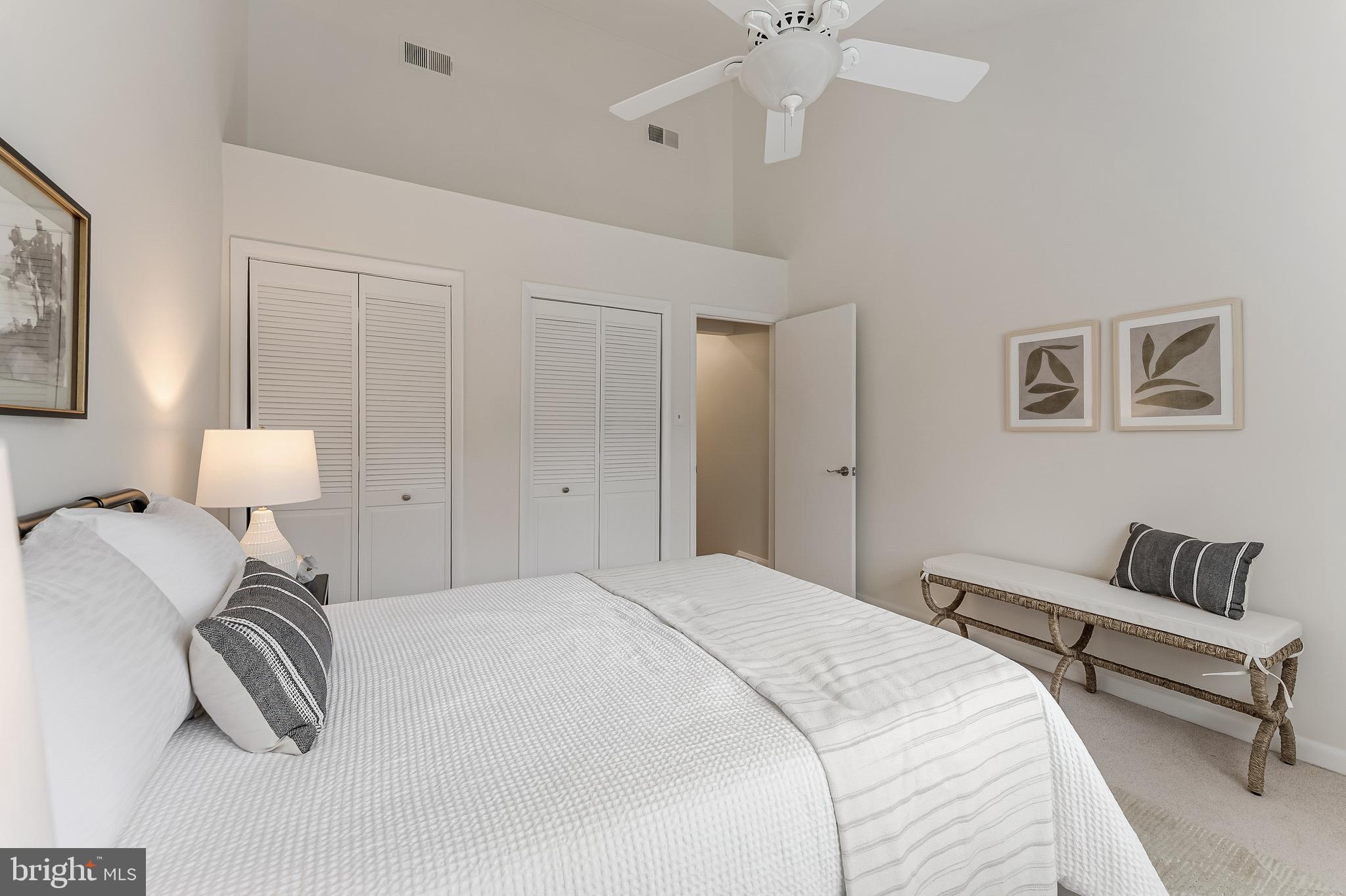 2261 Cedar Cove Court Reston, VA 20191 - Photo 41 of 102 a bedroom with bed and a couch