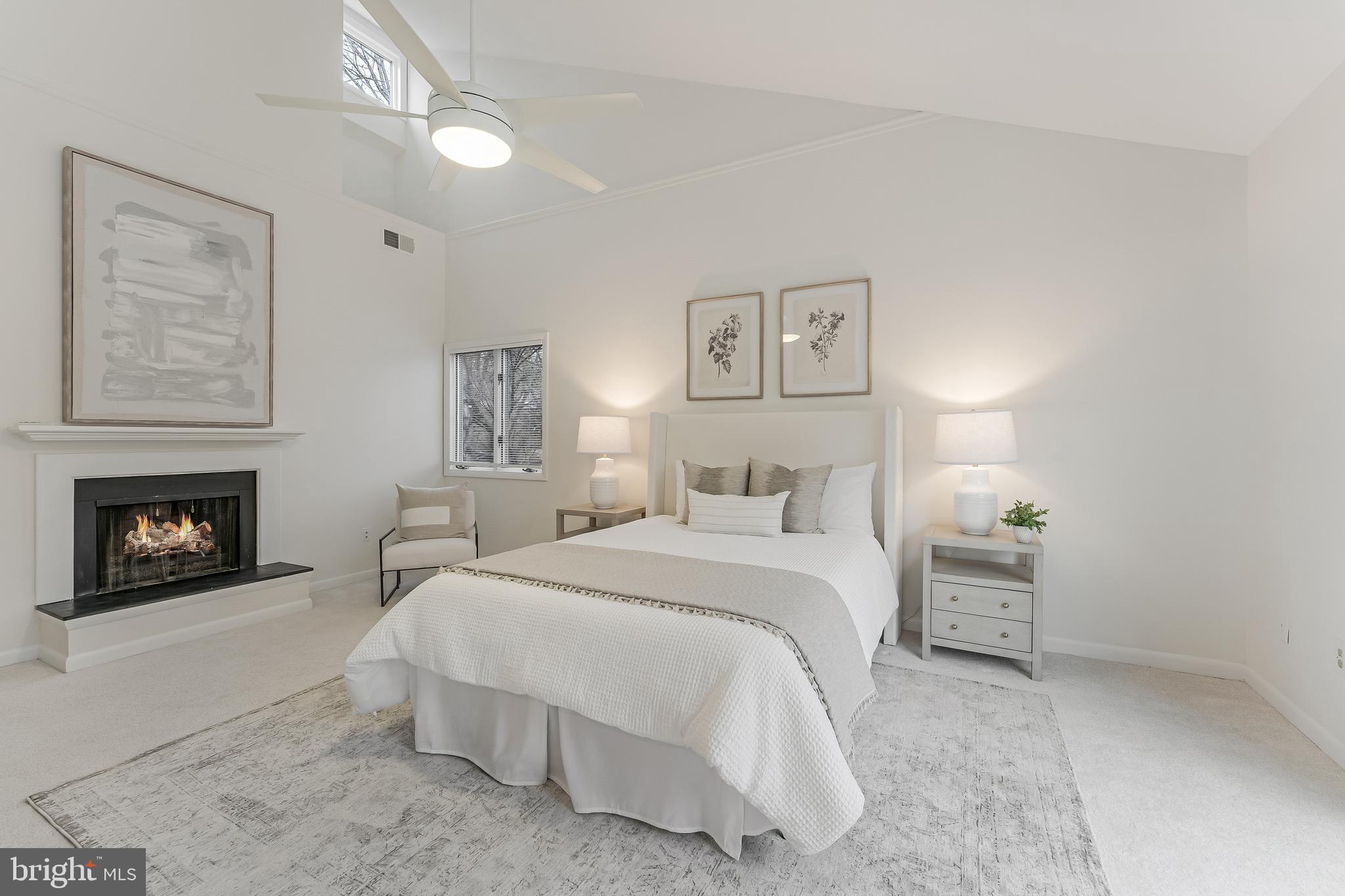 2261 Cedar Cove Court Reston, VA 20191 - Photo 51 of 102 a bedroom with a bed and a lamp on dresser