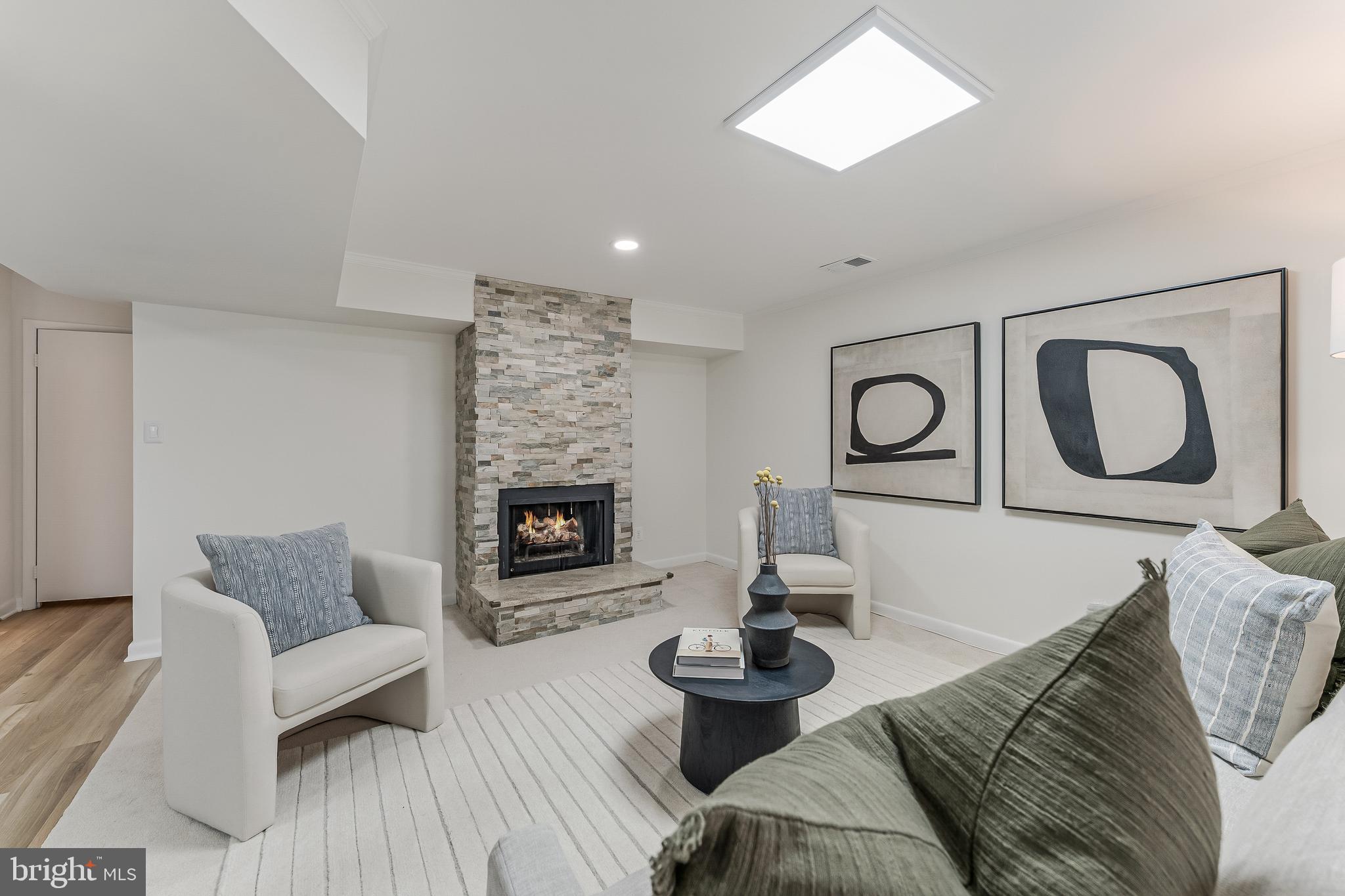 2261 Cedar Cove Court Reston, VA 20191 - Photo 62 of 102 a living room with furniture and a fireplace