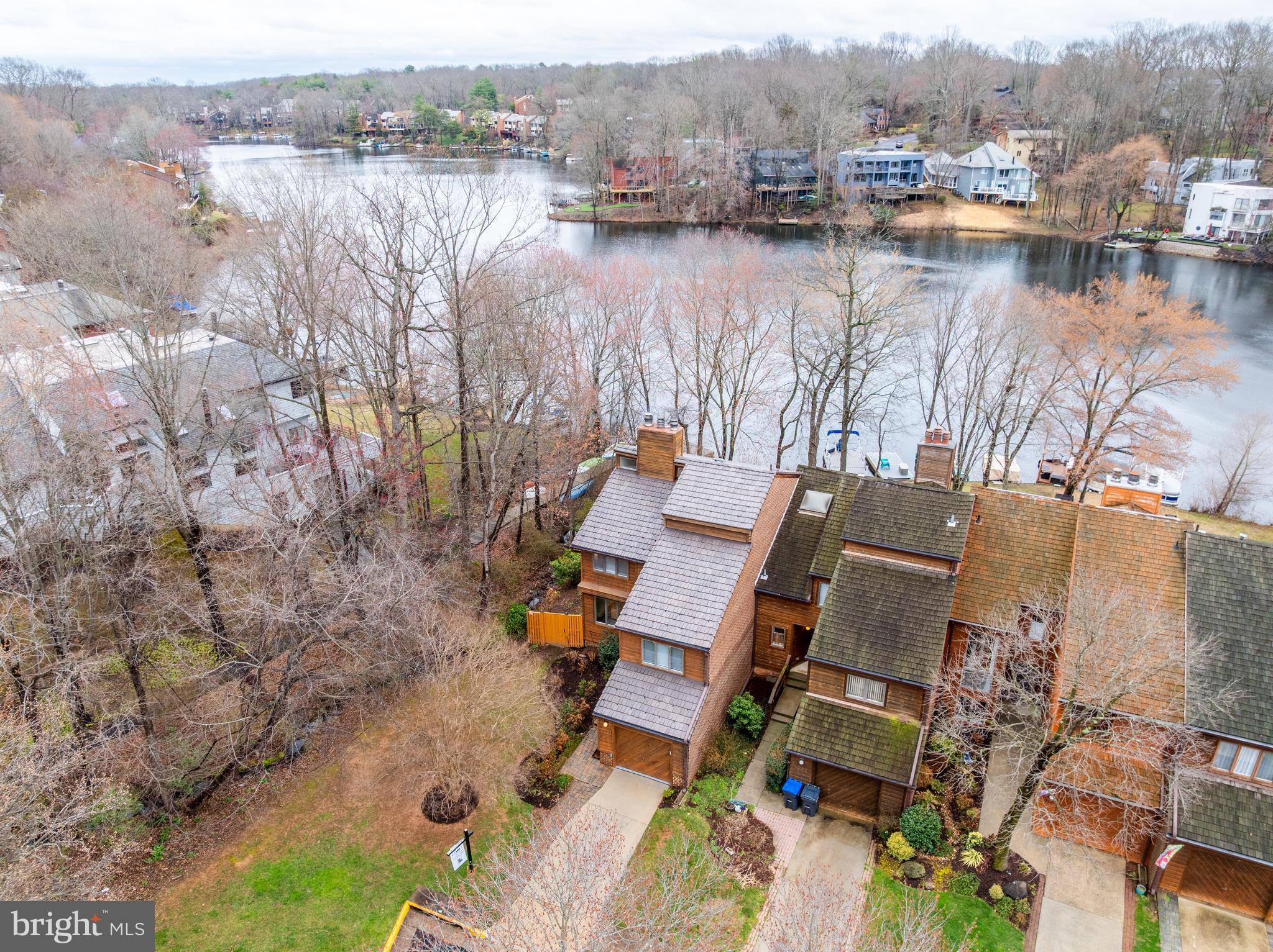 2261 Cedar Cove Court Reston, VA 20191 - Photo 75 of 102 an aerial view of residential house with outdoor space and lake view