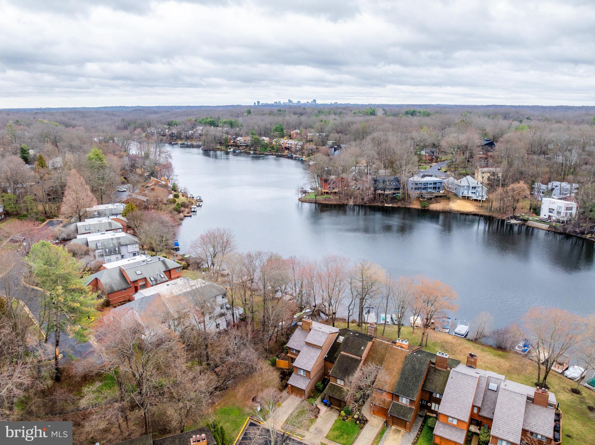 2261 Cedar Cove Court Reston, VA 20191 - Photo 77 of 102 an aerial view of a city with lots of residential buildings lake and ocean view
