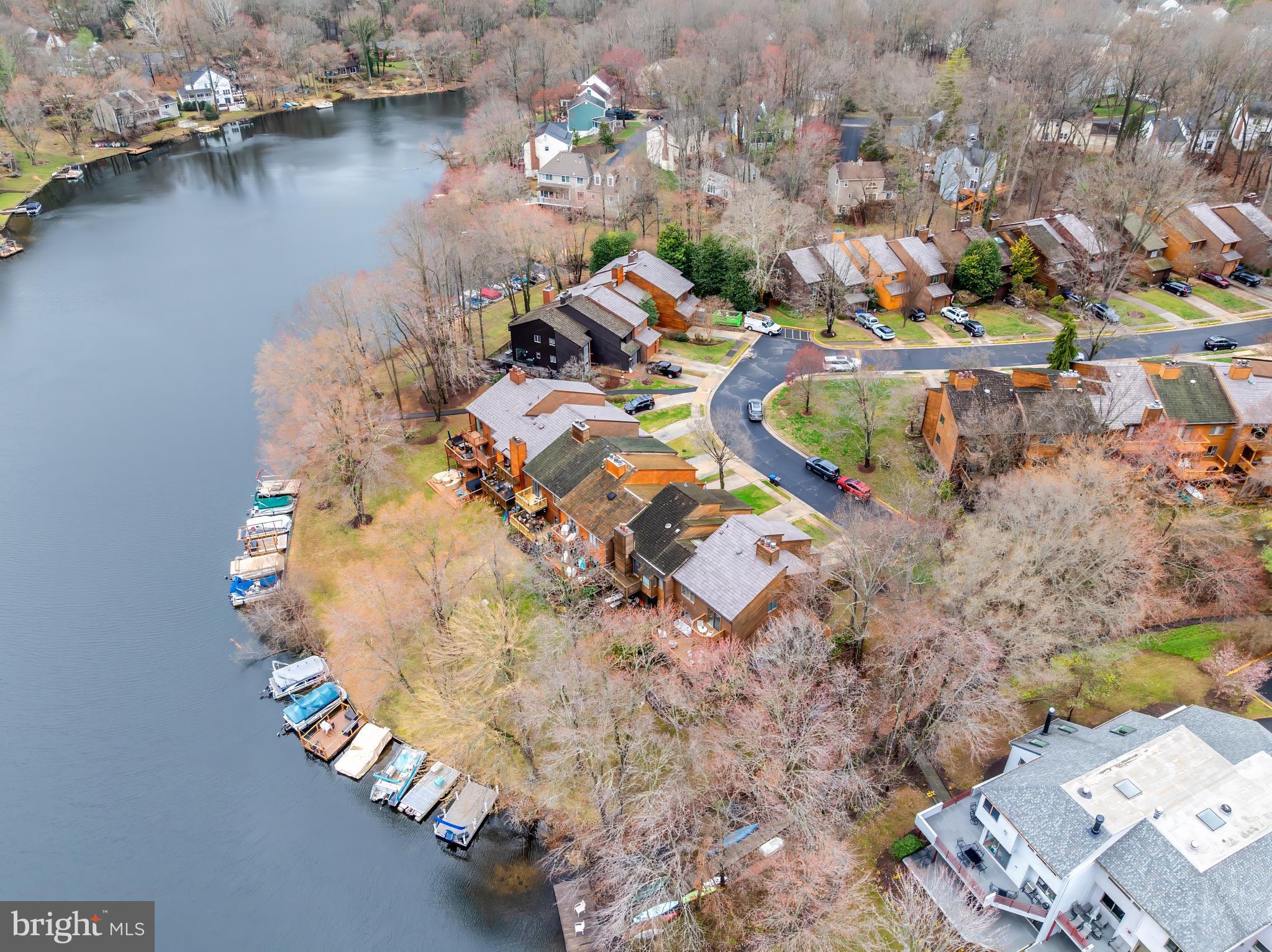 2261 Cedar Cove Court Reston, VA 20191 - Photo 95 of 102 an aerial view of a house with a lake view
