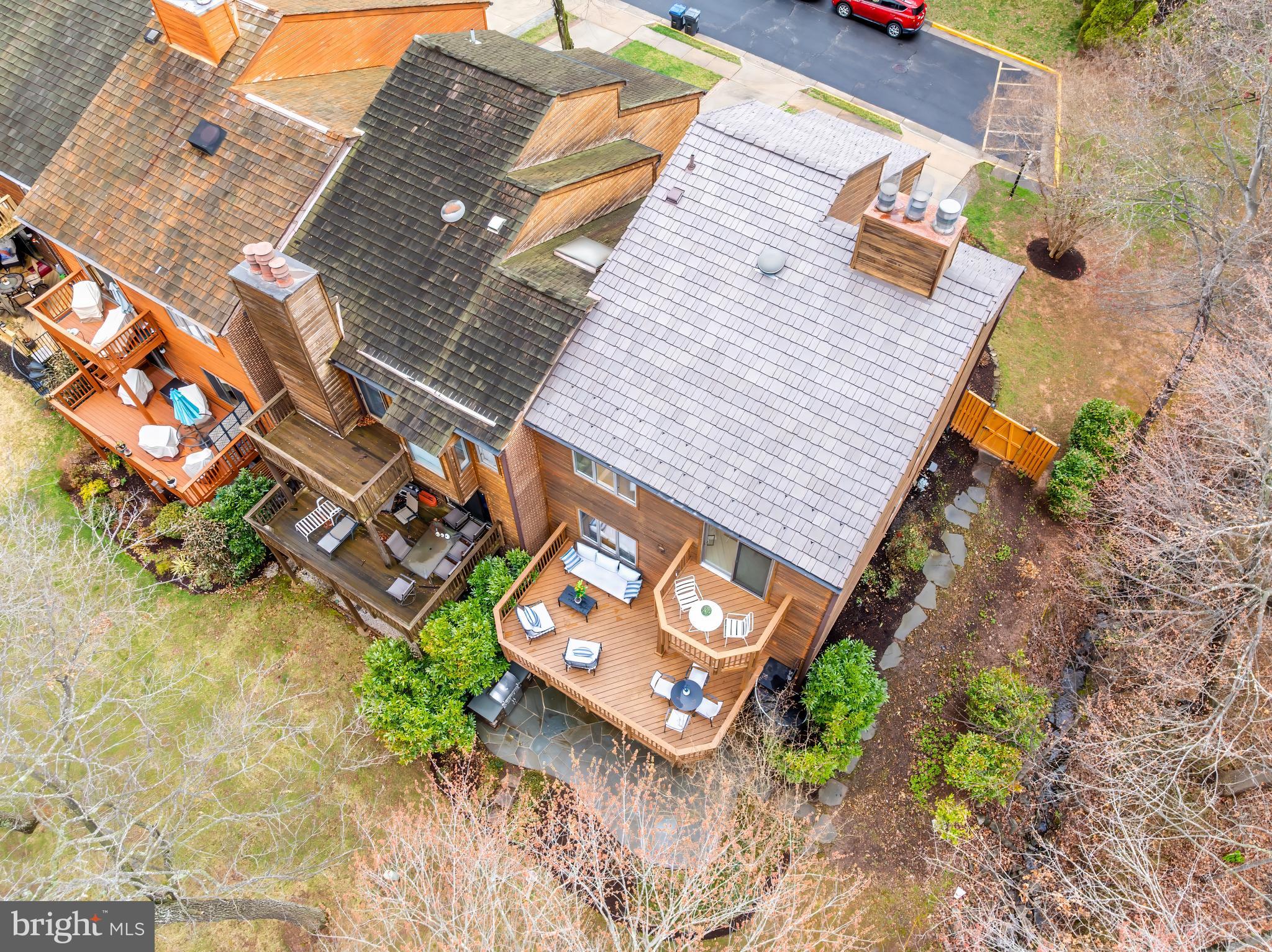 2261 Cedar Cove Court Reston, VA 20191 - Photo 98 of 102 an aerial view of a house with a yard and garden