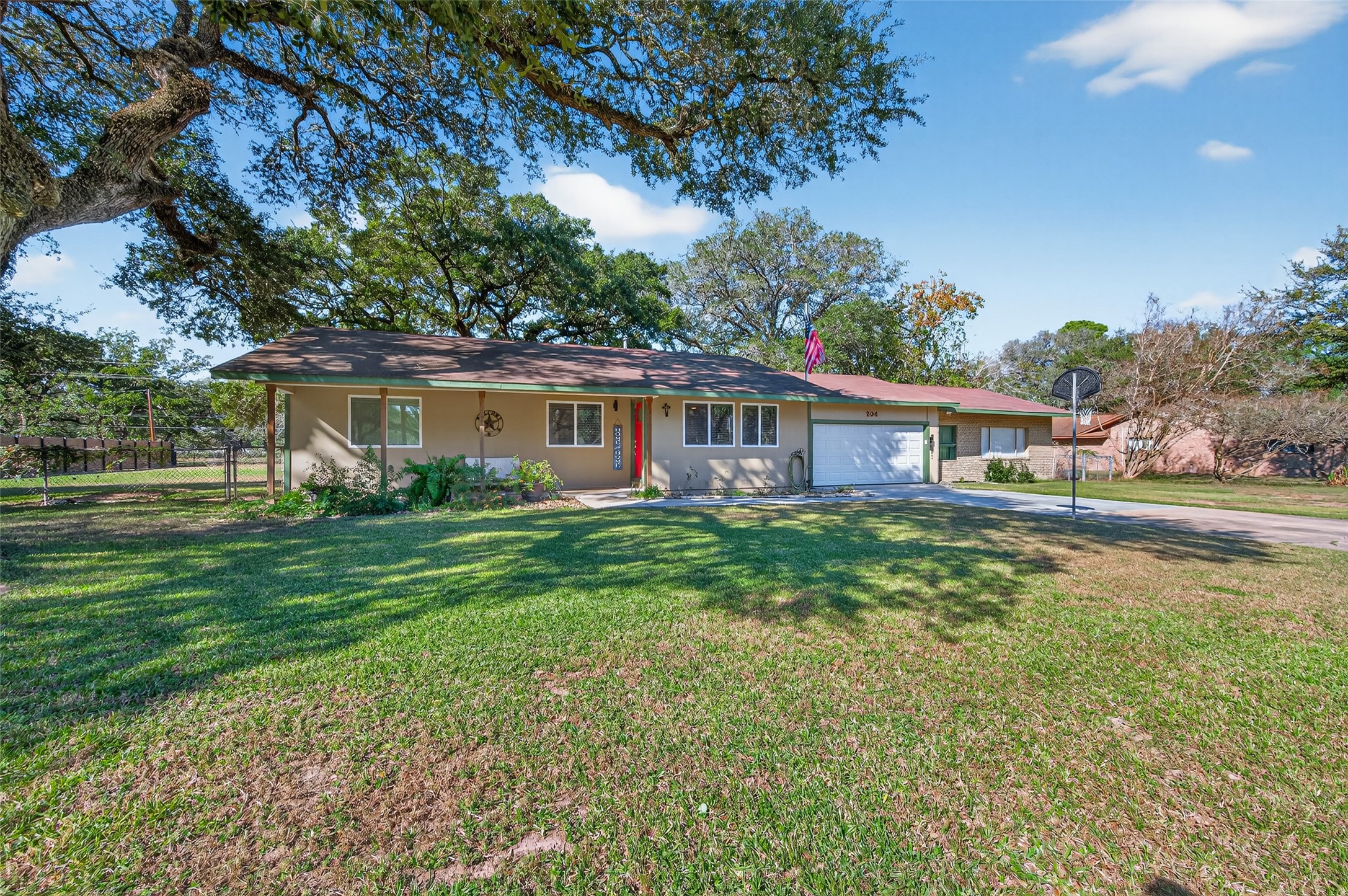 204 King Drive Columbus, TX 78934 - Photo 3 of 50 a house view with a garden space