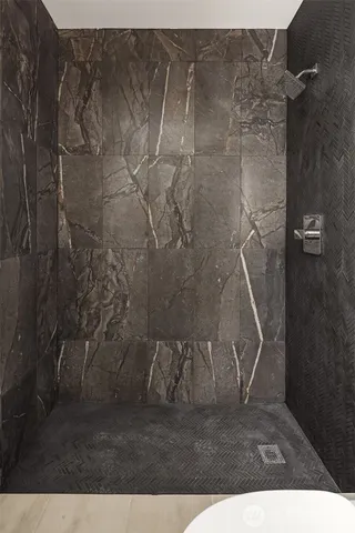 a bedroom with furniture and a table