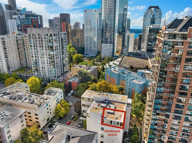 a view of a city with tall buildings