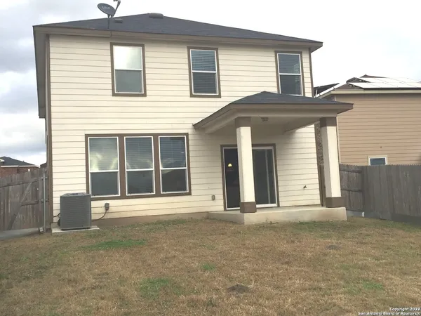 a front view of a house with a garage