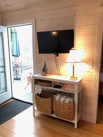 a living room with a couch and a flat screen tv