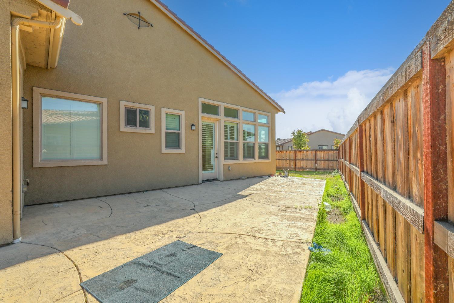 4129 Castellina Way Manteca, CA 95337 - Photo 14 of 58 a view of backyard with deck